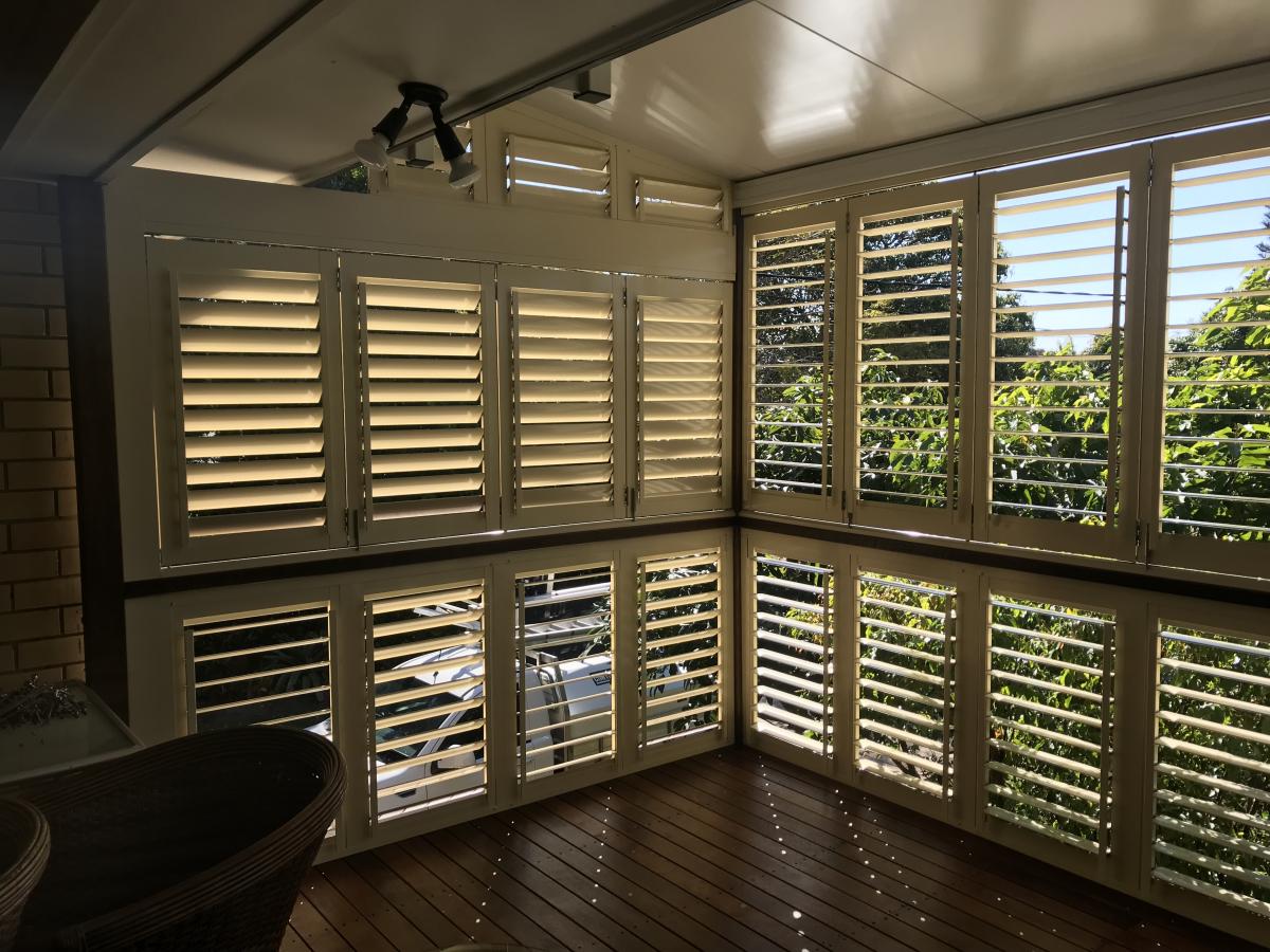 Infinity Plantation Shutters in white in the 2nd floor of the house