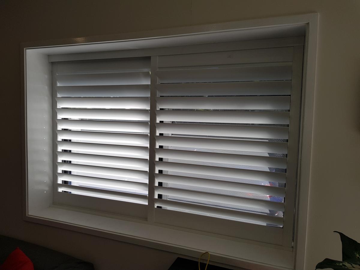 Plantation Shutters in color white for office room
